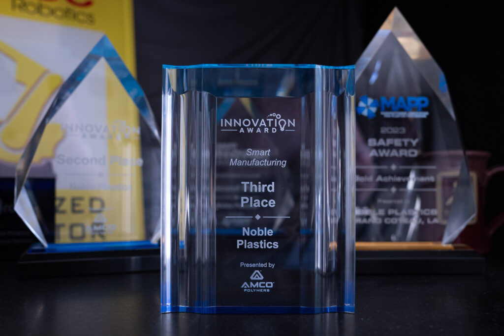A photo of a translucent trophy notating 3rd place in the innovation award for MAPP